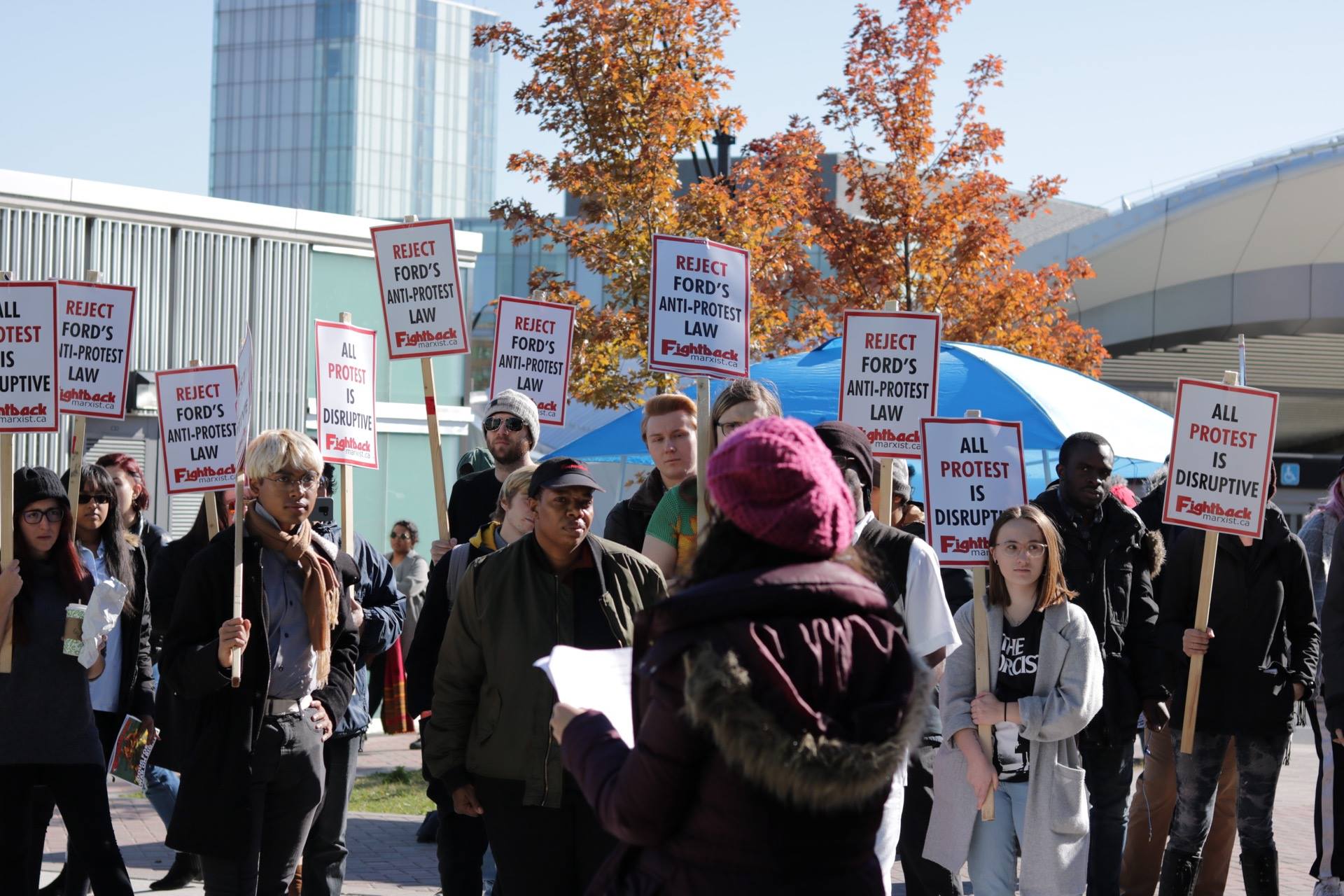 Protestors picketing against Doug Ford's anti-protest law